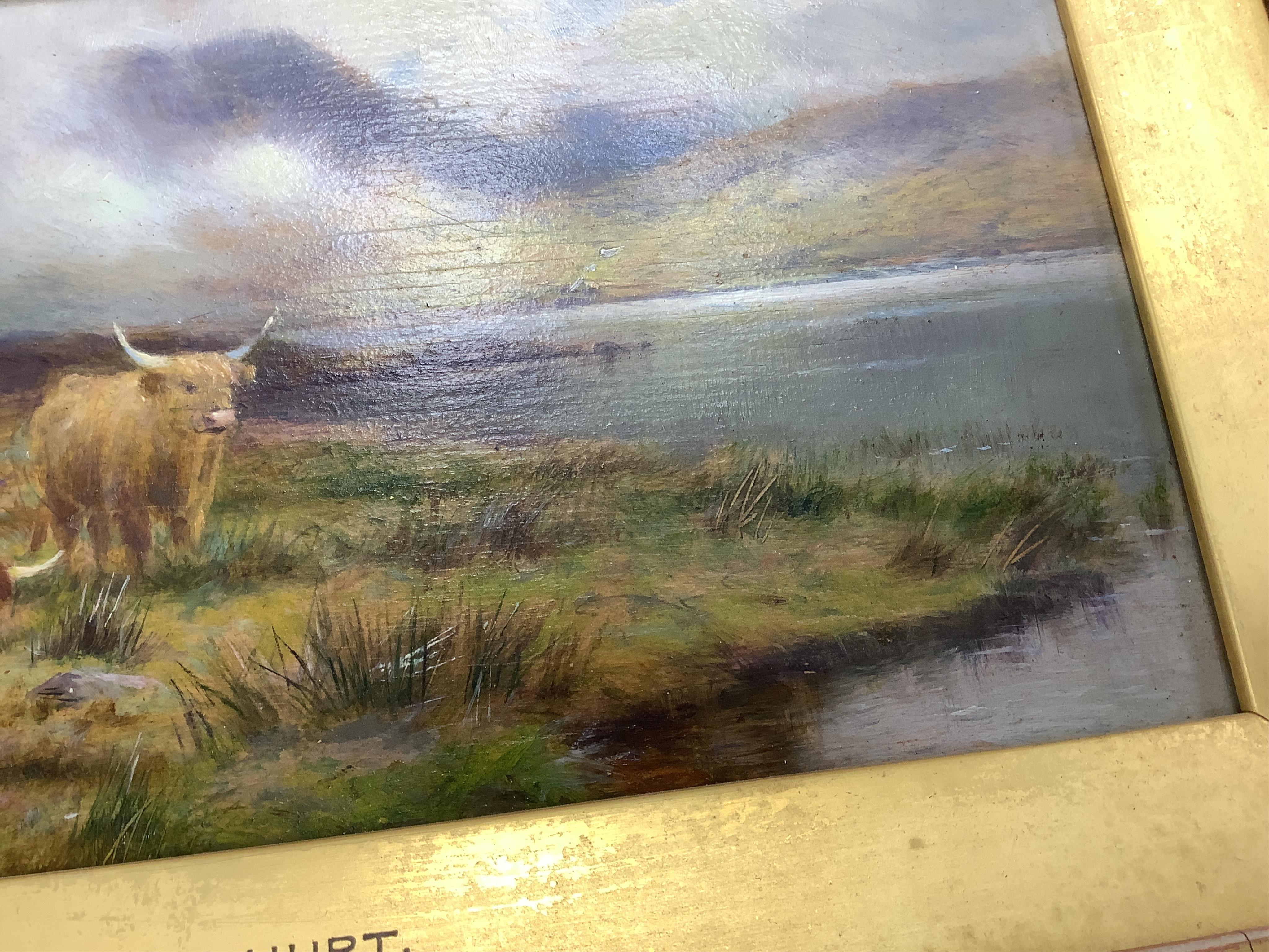 Louis Bosworth Hurt (1856-1929), Highland cattle by a loch, signed, oil on board, 12 x 23cm